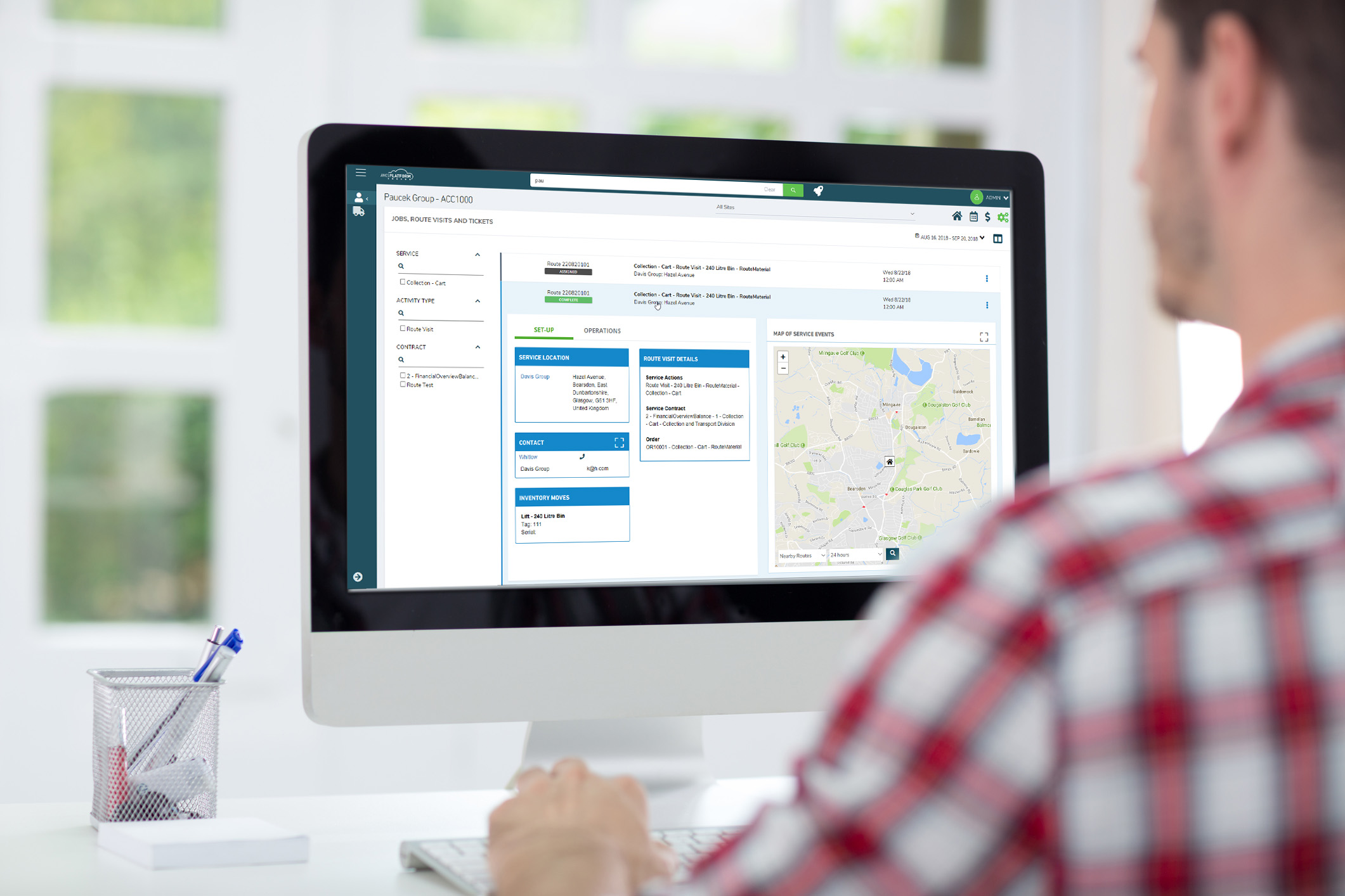 Man With Checkered Shirt Customer Portal Screen