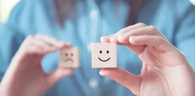 Man Holding Smileyface