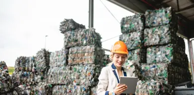 recycling worker using technology